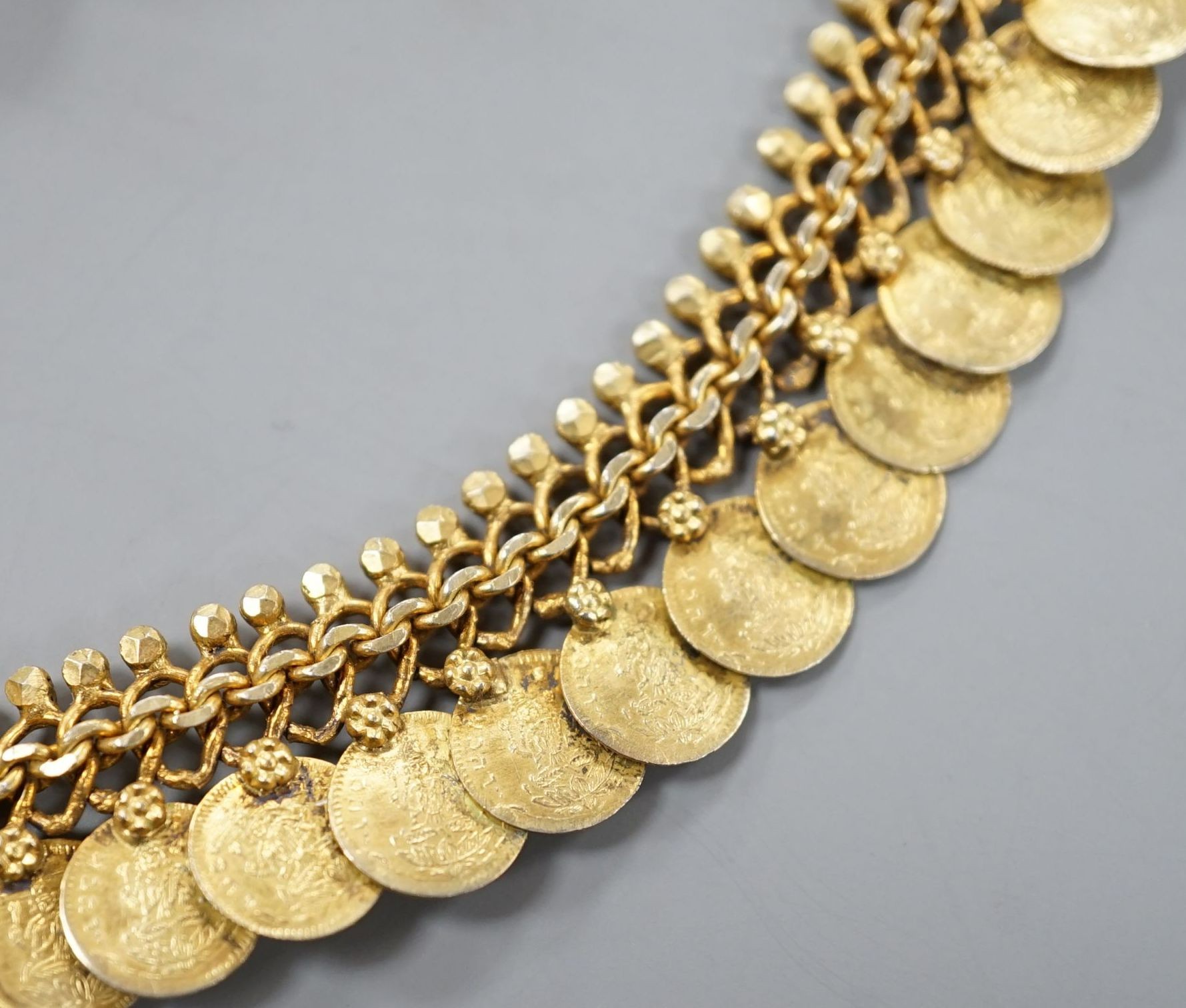A pair of yellow metal novelty earrings, modelled as pouring vessels, 26mm, 4.3 grams and a gilt metal 'coin' necklace.